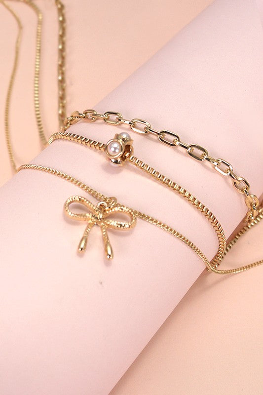 Multi Layer Pearl Bow Charm Necklace